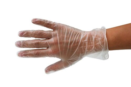 Handschuhe beim Testen von Kot auf Parasiten